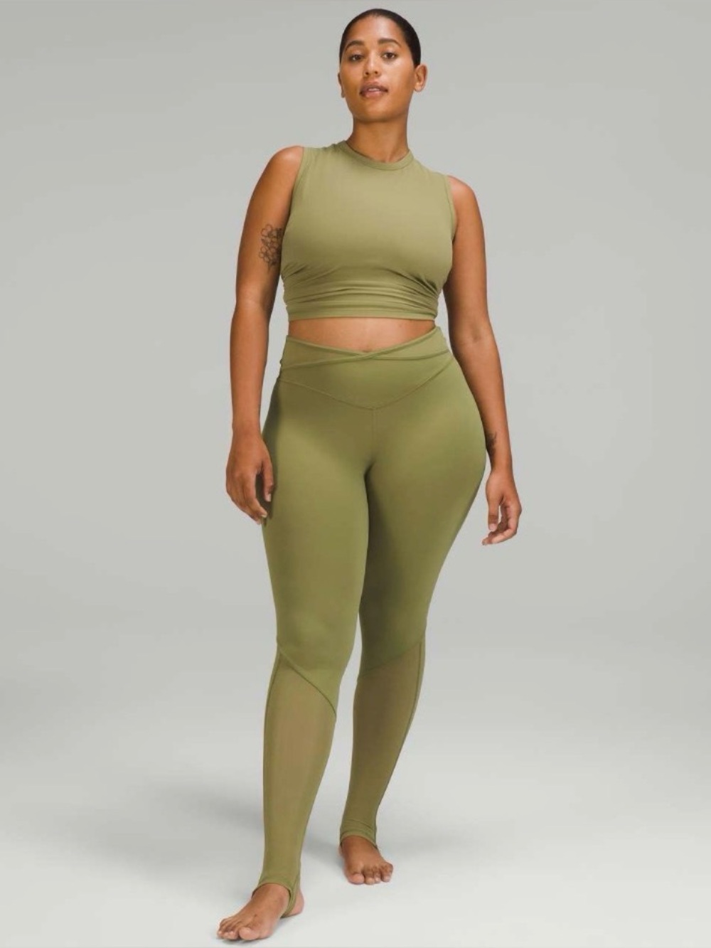 Lululemon Nulu and Crisscross Mesh Stirrup Tight Bronze Green. Size 12